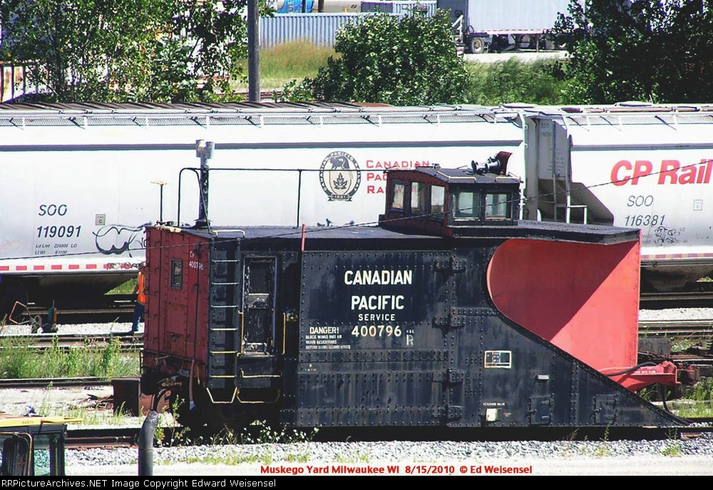 Russell plow sweltering in the August sun